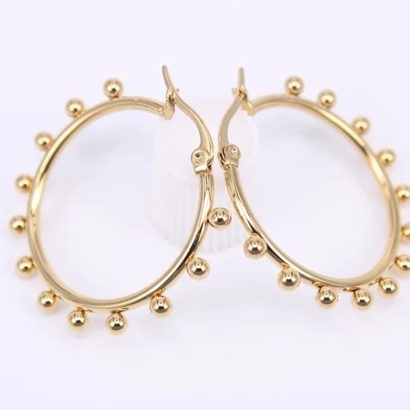 None Jewelry - 18K gold hoop earrings
